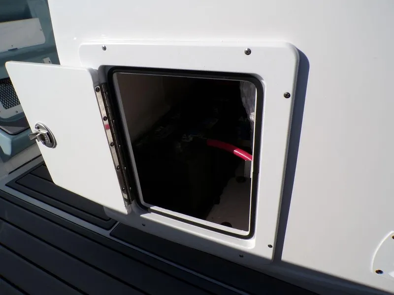 Slide: The Image of Open storage compartment on 2025 Tidewater 2700 CB boat. - 28