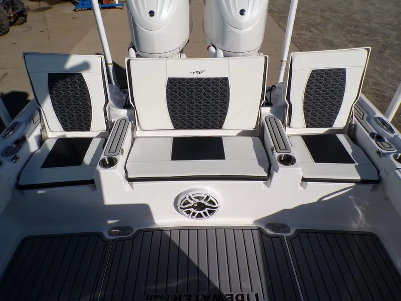Slide: The Image of 2025 Tidewater 2700 CB boat seating area with stylish upholstery and modern design. - 32