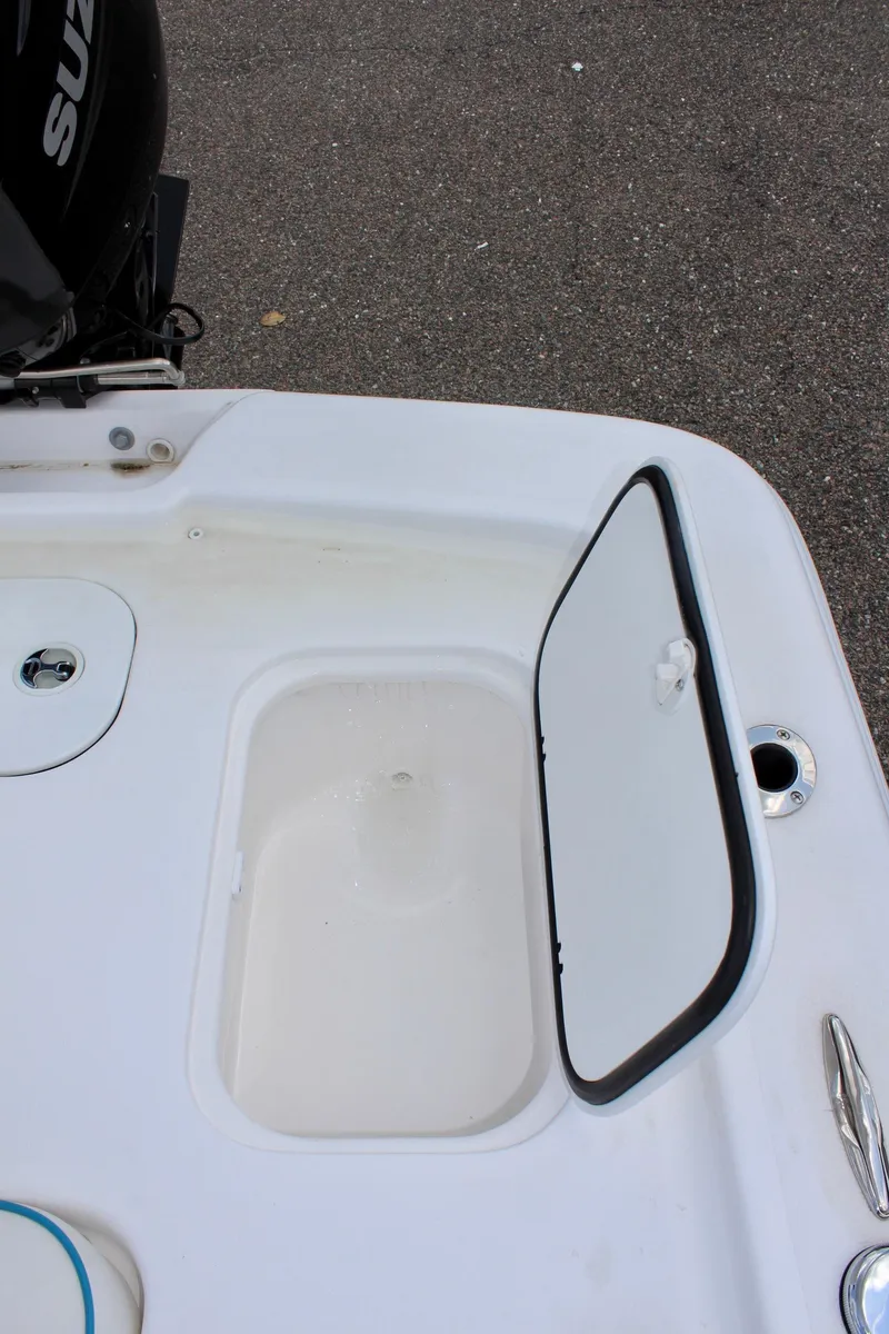 Slide: The Image of 2024 ALK2 Powerboats 17HS with open storage compartment. - 11