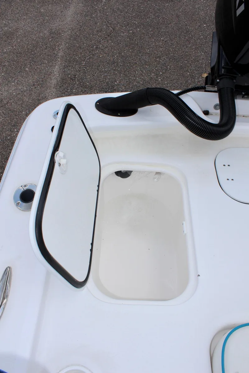 Slide: The Image of ALK2 Powerboats 17HS 2024, open storage compartment on deck. - 13