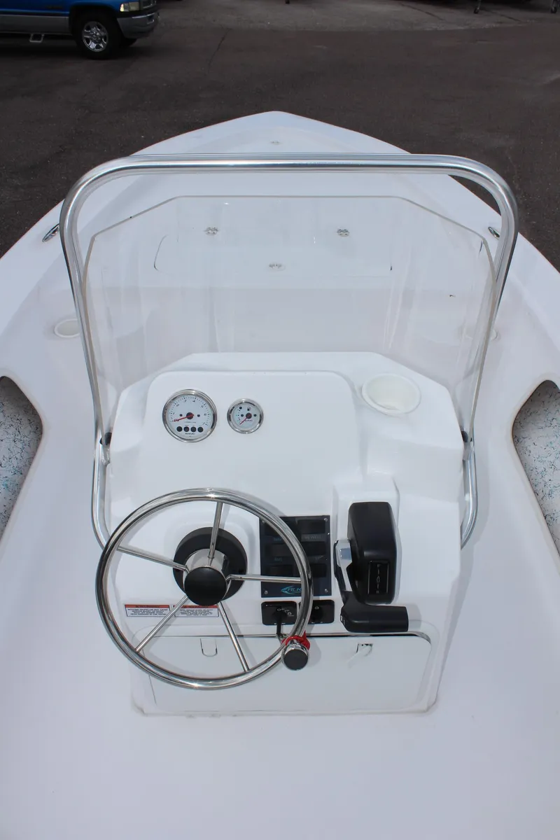 Slide: The Image of Steering console of a 2024 ALK2 Powerboats 17HS. - 15