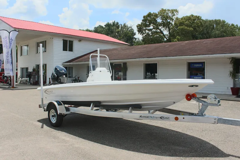 Slide: The Image of ALK2 Powerboats 17HS 2024 on trailer in front of building. - 4