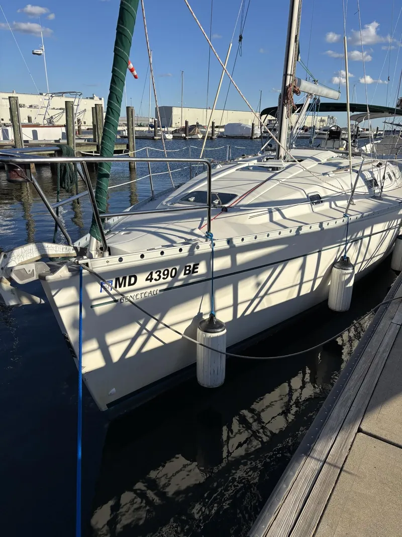 The Image of 1997 Beneteau Oceanis 351 sailboat docked at marina, sunny day, clear sky. - 0