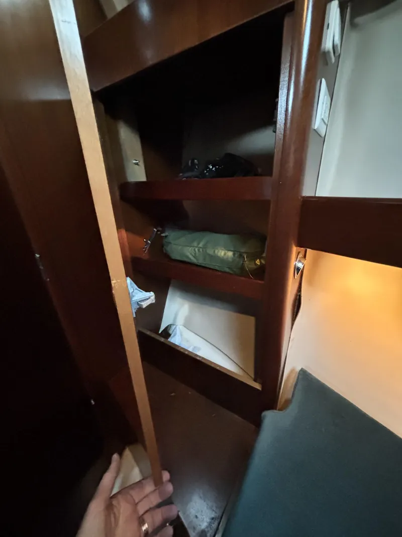 Slide: The Image of Interior storage shelves on a 1997 Beneteau Oceanis 351 sailboat. - 22