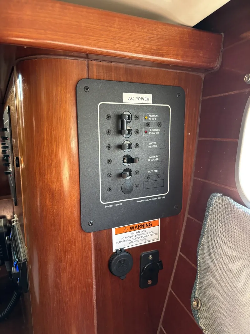Slide: The Image of AC power panel on 1997 Beneteau Oceanis 351 sailboat interior. - 30
