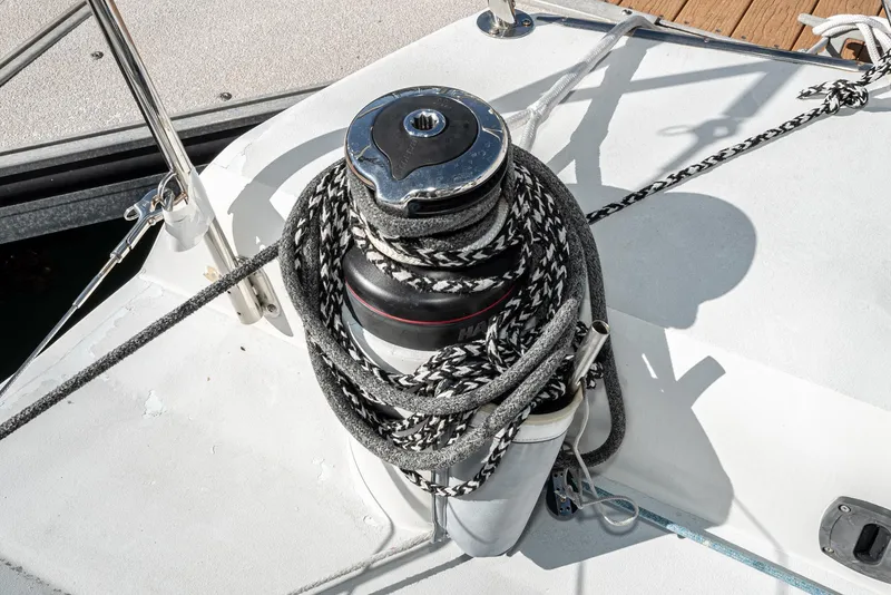 Slide: The Image of Sailboat winch with coiled rope on Tripp 47, 1992 model. - 12