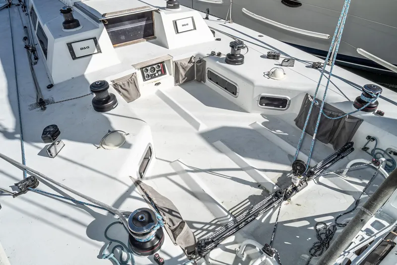 Slide: The Image of Deck of 1992 Tripp 47 sailboat with winches and ropes. - 15