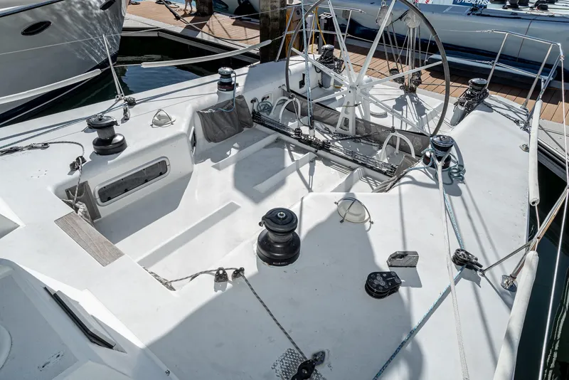 Slide: The Image of Cockpit of a 1992 Tripp 47 sailboat with winches and steering wheel. - 16