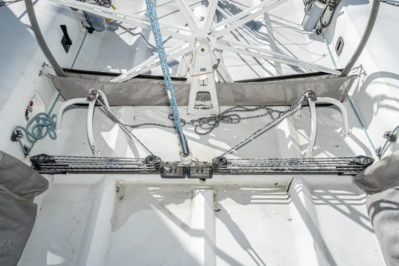 Slide: The Image of Cockpit of 1992 Tripp 47 sailboat with rigging and control lines. - 17