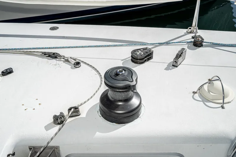 Slide: The Image of Deck of a 1992 Tripp 47 sailboat with winch and rigging. - 18