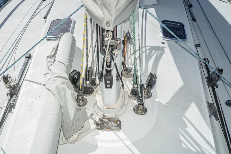 Slide: The Image of Deck of 1992 Tripp 47 sailboat with rigging and ropes. - 28