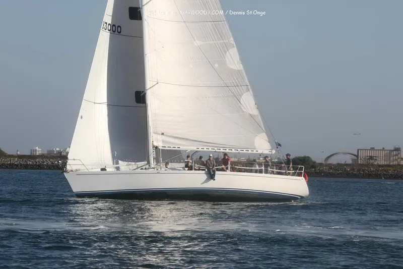 Slide: The Image of Sailboat Tripp 47, 1992 model, cruising on calm waters under clear skies. - 3