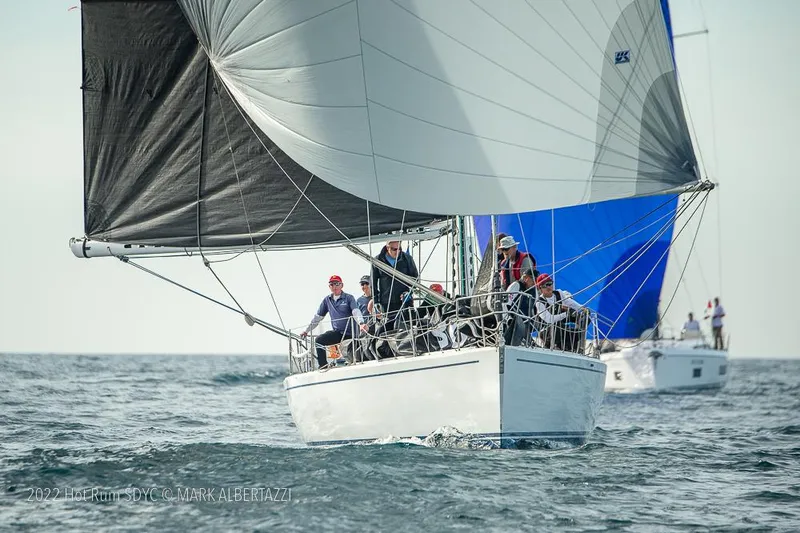 Slide: The Image of Sailing yacht Tripp 47 from 1992 racing on open water with crew onboard. - 4