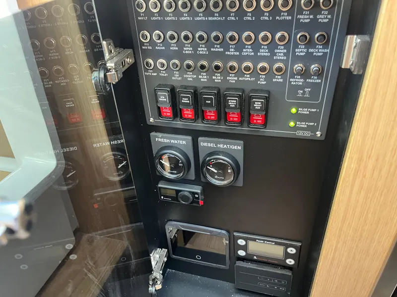 Slide: The Image of Control panel of Nimbus W11 #46, 2025 model, featuring switches and gauges. - 49