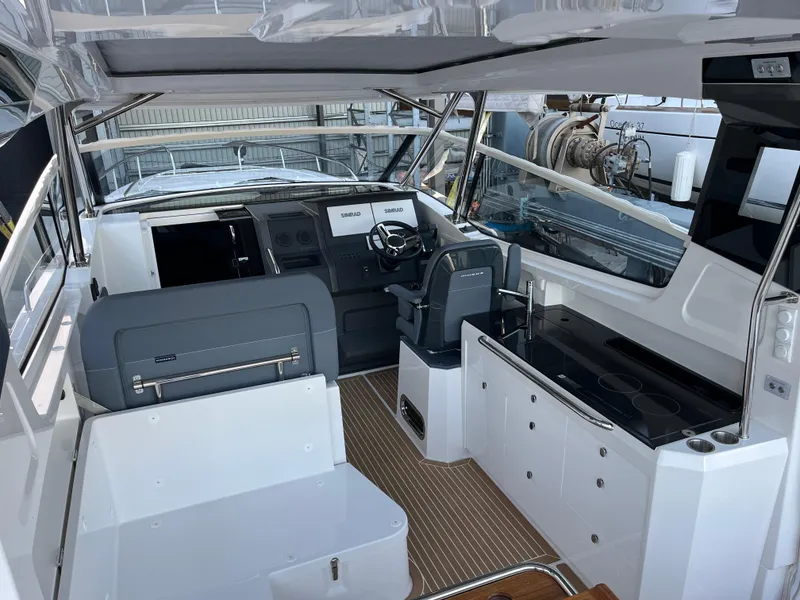 Slide: The Image of Interior of 2025 Nimbus W11 #46 boat, featuring sleek design and modern controls. - 7