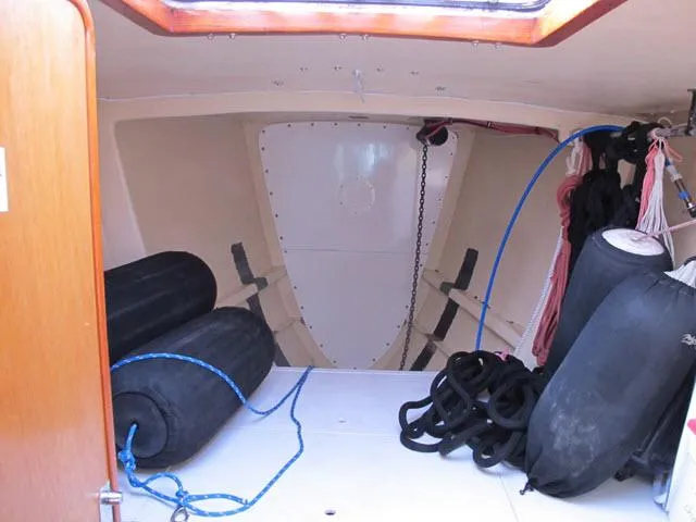 Slide: The Image of Interior of 1985 Santa Cruz 70 sailboat with ropes and fenders. - 27
