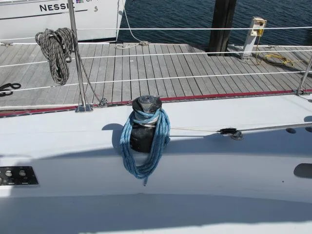 Slide: The Image of Sailboat deck with winch and blue rope, Santa Cruz 70, 1985 model. - 36