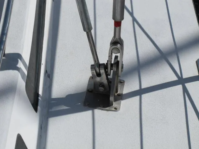 Slide: The Image of Close-up of rigging hardware on a 1985 Santa Cruz 70 sailboat deck. - 42