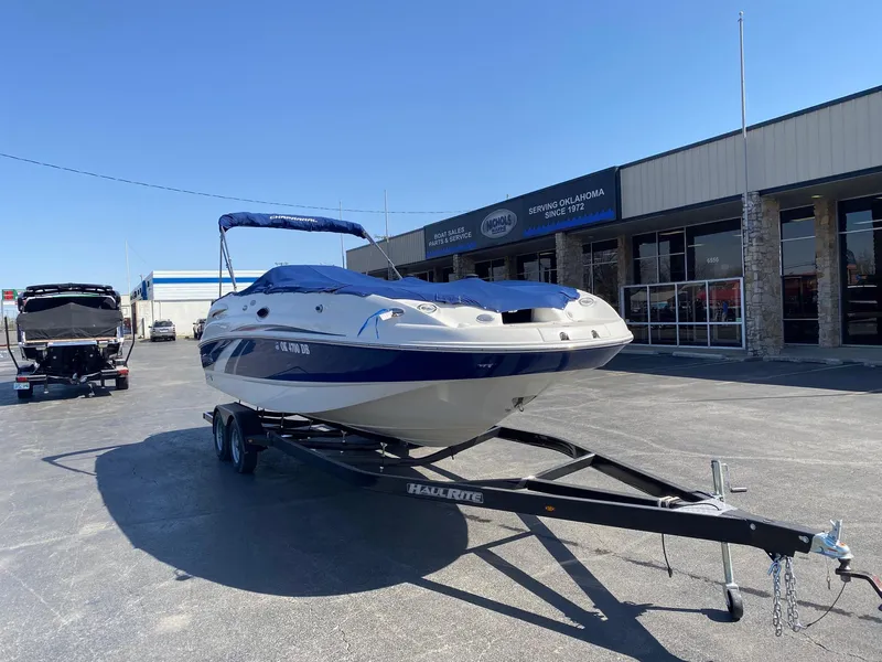 Slide: The Image of 2007 Chaparral Sunesta 252 boat on trailer, parked outside dealership. - 4