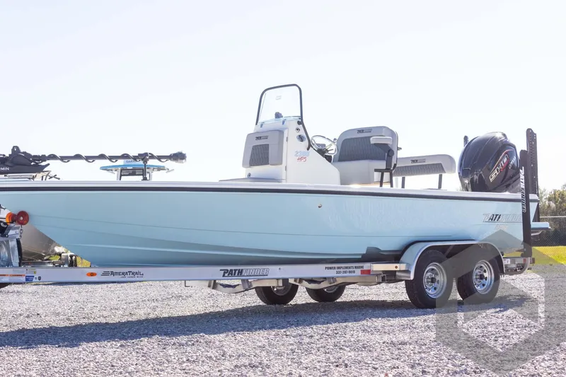 Slide: The Image of 2025 Pathfinder 2300 HPS boat on trailer, side view, outdoors. - 11