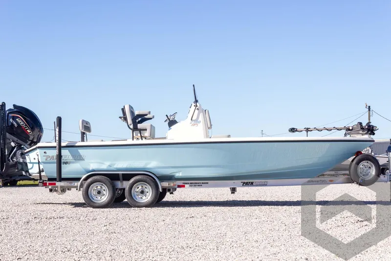 Slide: The Image of 2025 Pathfinder 2300 HPS boat on trailer, side view, outdoors. - 14
