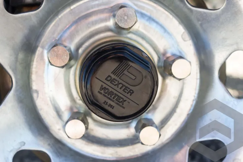 Slide: The Image of Close-up of a Dexter Vortex wheel hub on a 2025 Pathfinder 2300 HPS. - 20