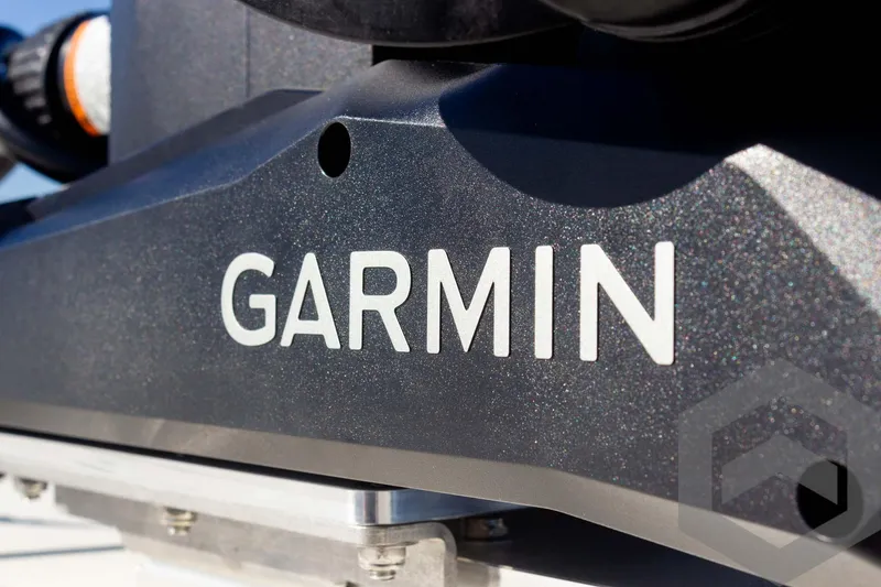 Slide: The Image of Garmin device on 2025 Pathfinder 2300 HPS boat, close-up view. - 22