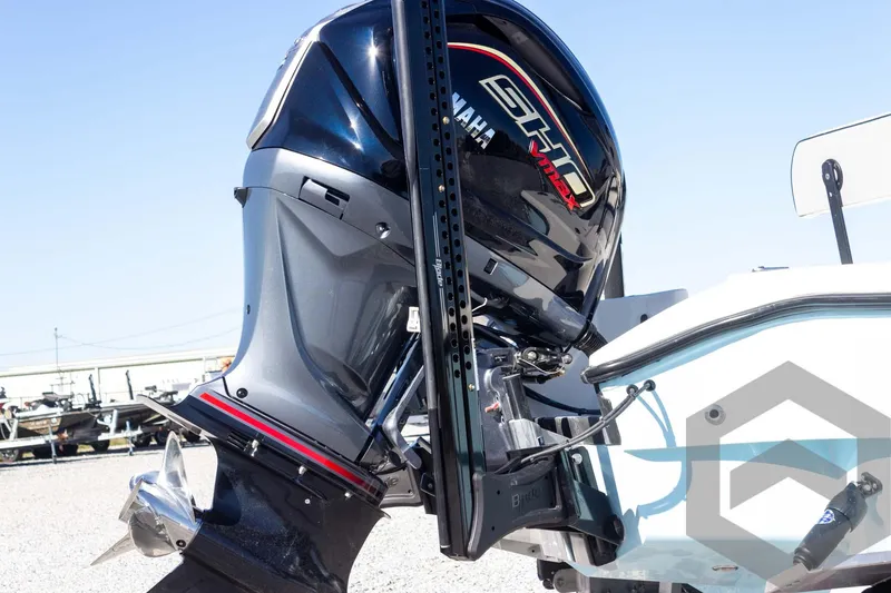 Slide: The Image of 2025 Pathfinder 2300 HPS boat with Yamaha outboard motor, side view. - 25