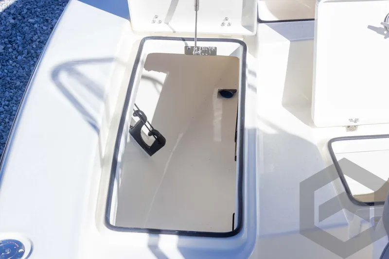 Slide: The Image of 2025 Pathfinder 2300 HPS boat storage compartment with open hatch. - 34