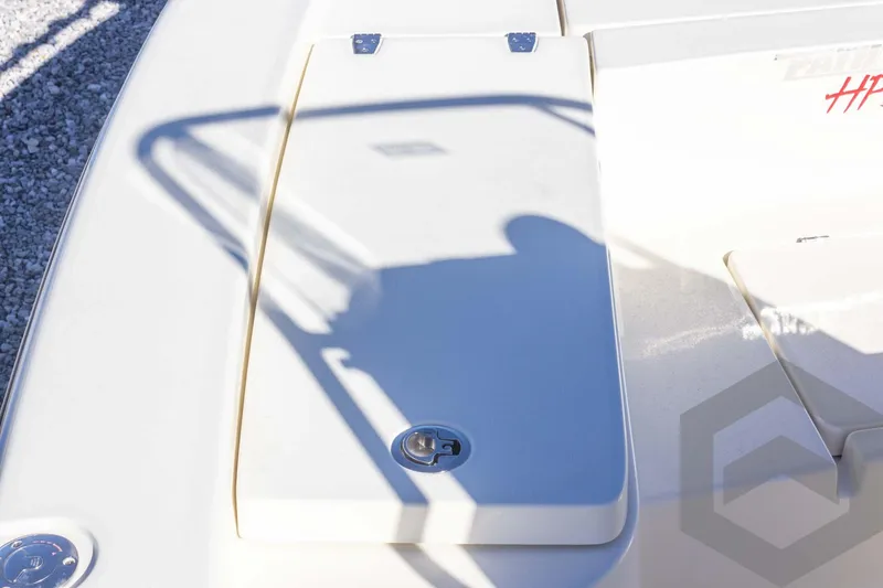 Slide: The Image of 2025 Pathfinder 2300 HPS boat deck with storage compartment and shadow. - 38
