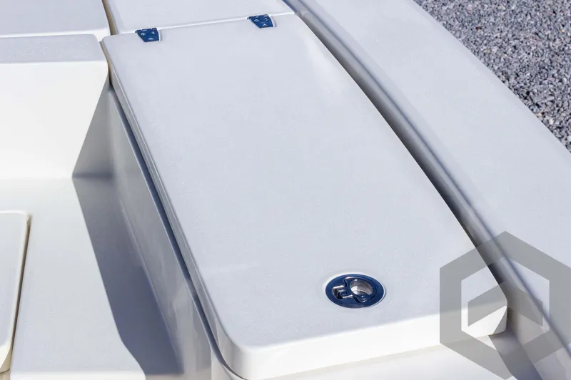 Slide: The Image of Pathfinder 2300 HPS 2025 boat deck detail with storage compartment. - 41