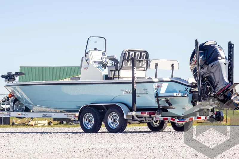 Slide: The Image of 2025 Pathfinder 2300 HPS boat on trailer, side view, outdoors. - 8