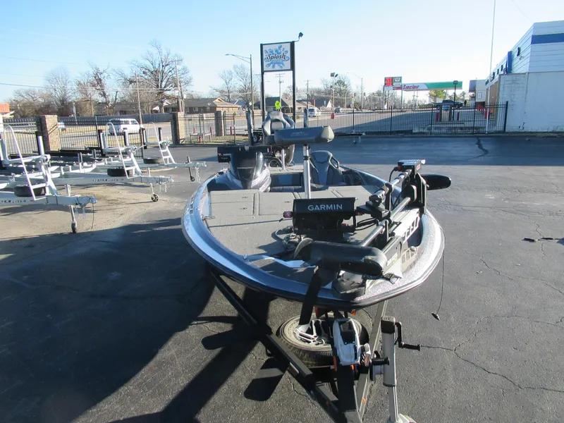Slide: The Image of 2021 Skeeter ZXR 21 fishing boat with Garmin equipment in a parking lot. - 5