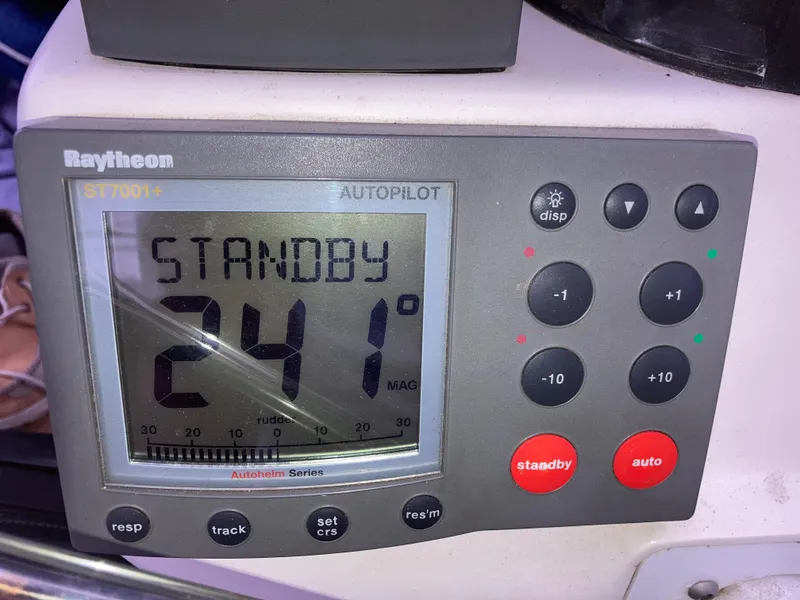 Slide: The Image of Raytheon autopilot display showing standby mode at 241 degrees on Malo 43, 2001 model. - 56