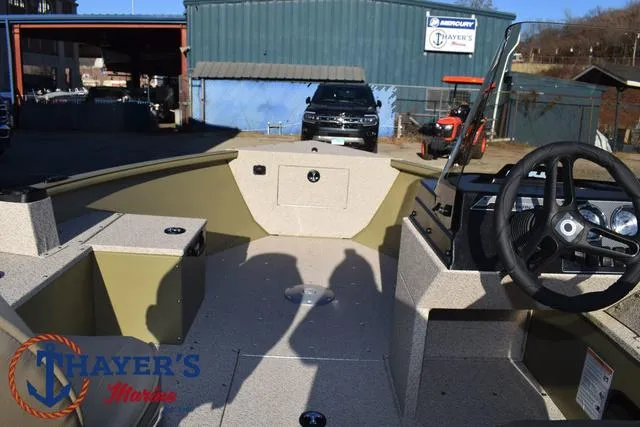 Slide: The Image of 2025 Lund 1875 Alaskan SS boat interior at Thayer's Marine dealership. - 10