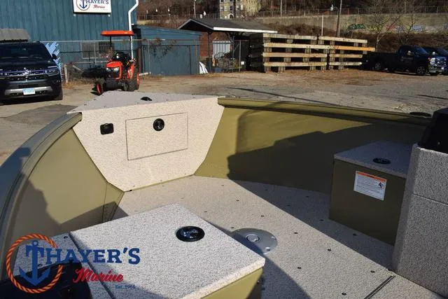 Slide: The Image of 2025 Lund 1875 Alaskan SS boat interior at Thayer's Marine dealership. - 11