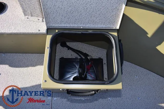 Slide: The Image of 2025 Lund 1875 Alaskan SS boat storage compartment with Thayer's Marine logo. - 14