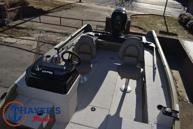 Slide: The Image of 2025 Lund 1875 Alaskan SS boat interior with two seats and steering console. - 20