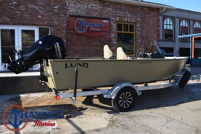 Slide: The Image of 2025 Lund 1875 Alaskan SS boat on trailer outside Thayer's Marine. - 3