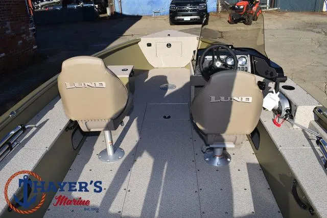 Slide: The Image of 2025 Lund 1875 Alaskan SS boat interior with dual seats and steering console. - 37