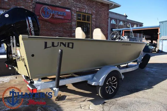 Slide: The Image of 2025 Lund 1875 Alaskan SS boat on trailer at Thayer's Marine dealership. - 43