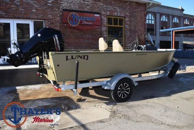 Slide: The Image of 2025 Lund 1875 Alaskan SS boat on trailer at Thayer's Marine dealership. - 44