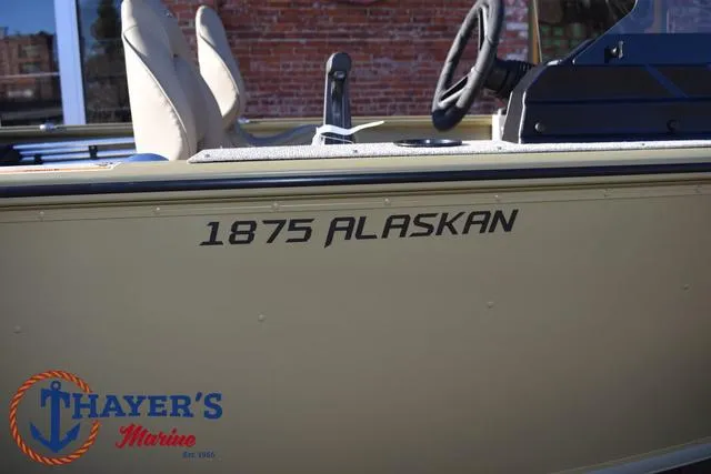 Slide: The Image of 2025 Lund 1875 Alaskan SS boat at Thayer's Marine dealership. - 5