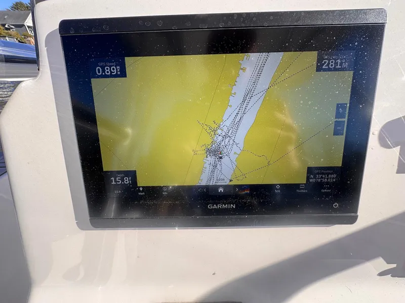 Slide: The Image of Garmin navigation display on 2024 Aquasport 2200 Center Console boat. - 19