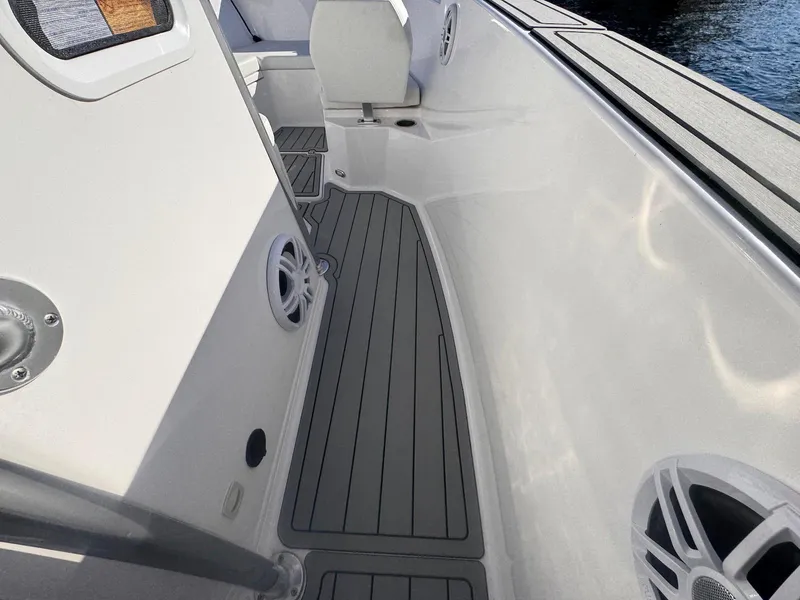 Slide: The Image of 2024 Aquasport 2200 Center Console boat interior with sleek design and modern features. - 26