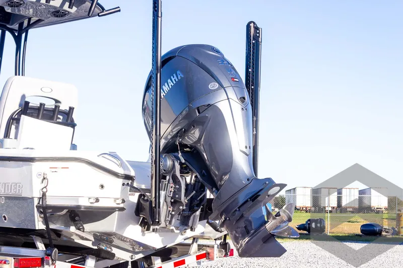Slide: The Image of 2025 Pathfinder 2500 Hybrid boat with Yamaha outboard motor on trailer. - 10