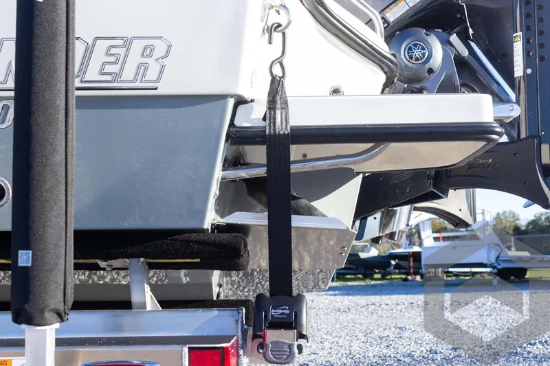 Slide: The Image of 2025 Pathfinder 2500 Hybrid boat trailer with secure tie-down strap. - 21