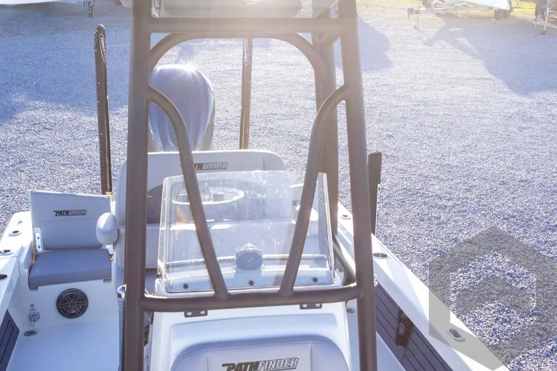 Slide: The Image of 2025 Pathfinder 2500 Hybrid boat, rear view, sunny day, gravel background. - 34