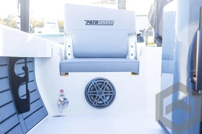 Slide: The Image of 2025 Pathfinder 2500 Hybrid boat interior with seating and speaker system. - 40
