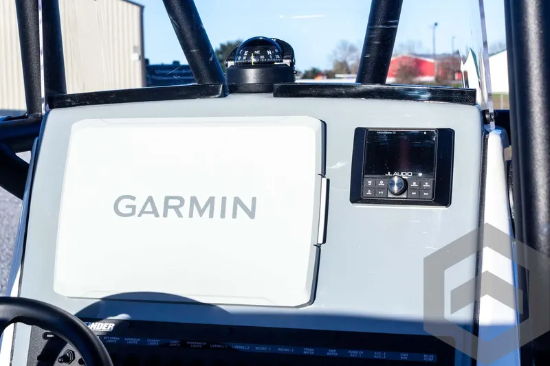 Slide: The Image of Pathfinder 2500 Hybrid 2025 boat dashboard with Garmin navigation system. - 45